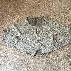 Never worn Gymshark long sleeved crop top with detail keyhole in small